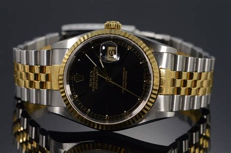 rolex women's watch oyster perpetual gold with black face|rolex oyster price guide.